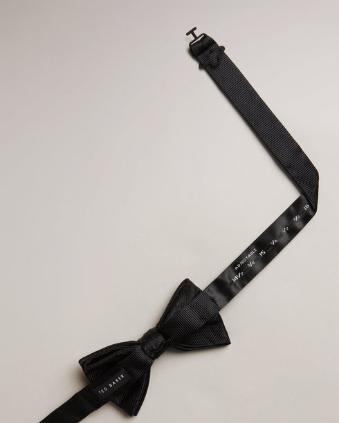 BROSNEY-Ties-The BROSNEY bow tie is the perfect way to add some panache to your look. Made from pure silk, this tie features a ribbed texture for an extra dapper feel. It comes ready-tied for minimal fussing, and has an adjustable neck band for your perfect fit. Bow tie 100% silk Ottoman ribbed texture Pre-tied Adjustable length- Ted Baker Romania